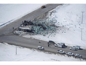 The wreckage of a fatal crash outside of Tisdale, Sask., is seen on April, 7, 2018. The president of the Humboldt Broncos says a sub-committee is ready for regular meetings to discuss a permanent memorial site for those who died in April's crash. Jamie Brockman says more dialogue will now begin since a safety review of the rural intersection where the crash took place is complete. Sixteen people died and 13 others were injured when the Broncos's team bus collided with a semi trailer at the intersection north of Tisdale.