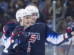 Columnist Rob Vanstone expects Oliver Wahlstrom, far left, and his United States teammates to win the world junior hockey championship Jan. 5 in Vancouver.