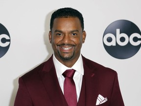 FILE - In this Aug. 7, 2018 file photo, Alfonso Ribeiro arrives at the Disney/ABC 2018 Television Critics Association Summer Press Tour in Beverly Hills, Calif. Ribeiro is suing creators of Fortnite and NBA 2K for using his famous dance as Carlton from "The Fresh Prince of Bel-Air" on the popular video games. In separate lawsuits filed Monday in federal court in Los Angeles, Ribeiro alleges that Fortnite-maker Epic Games and 2K Sports-creator Take-Two Interactive used his dance dubbed "The Carlton Dance" without permission or giving him credit.