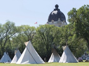 Teepees are seen at the Justice for Our Stolen Children camp near the Saskatchewan Legislative Building in Regina on Wednesday June 27, 2018. Saskatchewan Premier Scott Moe says he's never met with anyone protesting outside the legislature and didn't see a need to make an exception when Indigenous protesters set up a camp this past fall.