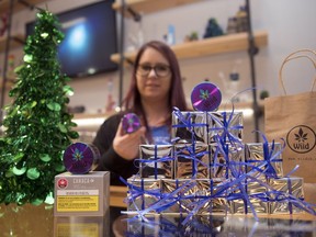 Melissa Uhersky, co-owner of Wiid Boutique, has cannabis related items wrapped up for sale in time for Christmas presents in Regina.