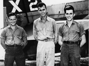 Future president George H.W. Bush (centre) photographed during his U.S. Navy service.