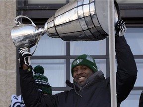 Corey Chamblin celebrates the Saskatchewan Roughriders' Grey Cup victory of 2013.