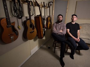 Brothers Darryl Kissick, left, and Avery Kissick sit in the jam space on King Street where they recorded Foxwarren's debut album. The band, which includes members Dallas Bryson and Andy Shauf, not shown, is named after the Kissicks' Manitoba hometown.