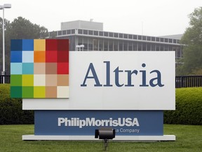 FILE - This April 23, 2008, file photo, shows the Altria Group Inc. corporate headquarters in Richmond, Va. The potential entry of one of the world's largest tobacco companies into the marijuana business is sending the shares of Cronos group rocketing this morning. Cronos is a Canadian cannabis company, which confirmed late Monday, Dec. 3, 2018, that it is in talks with Altria group about a possible investment.