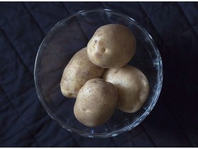 Potatoes are seen in Halifax on Monday, Nov. 28, 2016. Farmers across Canada left thousands of acres of potato crops unharvested after a slew of bad weather created challenging conditions, setting the stage for a possible shortage of the starchy dinner table staple.THE CANADIAN PRESS/Andrew Vaughan ORG XMIT: CPT115