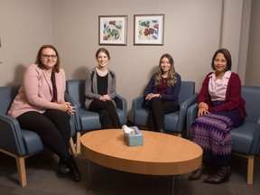 From left, Nichole Faller, Melissa Wuerch, Rhonda Stopyn and Seint Kokokyi, clinical psychology students at the University of Regina, sit together in a room at the Sun Life Financial Psychology Training Clinic located at the university. All were awarded the Friends of Meitheal Award for doing a placement at Randall Kinship Centre to learn from Indigenous people and understand their experiences and culture.