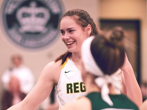 The University of Regina Cougars' Christina McCusker, shown Friday against the MacEwan Griffins, has reached the 100 career milestone in blocked shots.