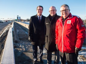 From left, Regina Mayor Michael Fougere, Saskatchewan Minister of Government Relations Warren Kaeding and Federal Public Safety Minister Ralph Goodale stand at the intersection of Ring Road and Winnipeg Street following a funding announcement regarding a new traffic bridge to be built in the area.