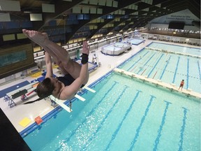 Alyssa Clairmont , of the Regina Diving Club, practices a dive at the Lawson Aquatic Centre in Regina. A proposed long-term plan calls for an expansion of the facility.