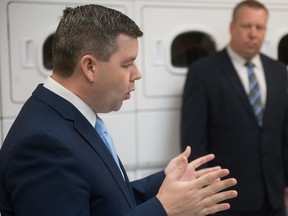 Saskatchewan trade and export development minister Jeremy Harrison speaks about reducing government red tape at an event held at Busy Bee Cleaners on East Quance Street on Jan. 22, 2019. Behind him is parks culture and sport minister Gene Makowsky.