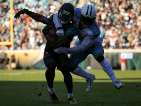 Defensive back Valentino Blake, shown on the right with the Tennessee Titans in 2016, is one of four players whose signings were announced Wednesday by the Saskatchewan Roughriders.