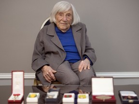 Marthe Cohn, 98, sits before some of the medals she received for military service. During the Second World War, the French Jewish woman spied for the Allies, posing as a nurse in Germany.