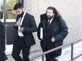 Jaskirat Singh Sidhu leaves provincial court with his lawyer Mark Brayford (right) in Melfort, Sask., Tuesday, January, 8, 2019. Sidhu, the driver of a transport truck involved in a deadly crash with the Humboldt Broncos junior hockey team's bus, has pleaded guilty to all charges against him.