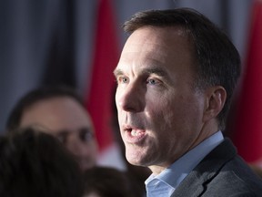 Finance Minister Bill Morneau arrives for a cabinet meeting in Sherbrooke, Que., Wednesday, Jan. 16, 2019.