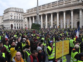 Protesters take part in an anti-government demonstration called by the Yellow Vests "Gilets Jaunes" movement, in Bordeaux, southwestern France.