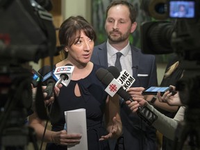 Kat Lanteigne, left, Executive Director of Blood Watch, joined NDP Leader Ryan Meili as they addressed the concern of a private business paying citizens for donating plasma cells instead of using Canadian Blood Services in Regina. The news scrum was held in the Legislative Building.