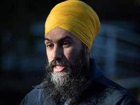 NDP Leader Jagmeet Singh is interviewed while door knocking for his byelection campaign, in Burnaby, B.C., on January 12, 2019. Jagmeet Singh is proposing three measures he says will help build 500,000 affordable housing units across Canada over the next 10 years. The NDP leader says the federal government should stop applying GST to the cost of building new affordable units.