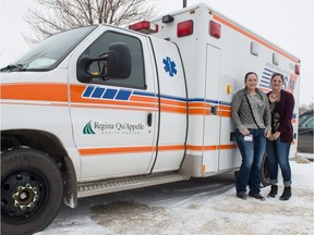 Paramedics Robin Focht, left, and Sarah Erickson stand in front of an ambulance outside of the General Hospital. The Saskatchewan Health Authority has signed on for some new training for Regina area paramedics to increase access to palliative care in home for patients and families as part of a bigger initiative funded and organized by The Canadian Partnership Against Cancer and the Canadian Foundation for Healthcare Improvement.