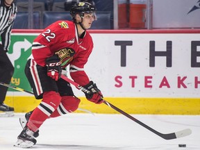 The Portland Winterhawks' Jaydon Dureau (22) carries the puck during a WHL game at the Brandt Centre on Wednesday.