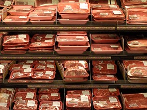 FILE - In this March 29, 2006, file photo, a wide variety of cuts of meat are displayed at the meat section of Cub Foods grocery store in a Burnsville, Minn. Standards proposed Wednesday, Jan. 21, 2015, by the Agriculture Department aim to reduce rates of salmonella and campylobacter, another pathogen that can cause symptoms similar to salmonella, in chicken parts, ground chicken and ground turkey. (AP Photo/Jayme Halbritter, File)