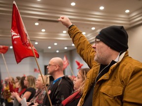 Unifor members follow a "solidarity" chant at a "Stand Up for Crown Workers" rally held at the Delta Hotel on Saskatchewan Drive prior to the start of bargaining efforts.