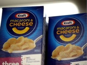 Boxes of Kraft Macaroni and Cheese are displayed on a grocery store shelf on February 22, 2019 in San Rafael, Ca. Kraft Heinz Co., maker of Kraft and Oscar Meyer products, reported a $12.6 billion fourth quarter loss and announced an Securities and Exchange Commission investigation into accounting policies with vendor agreements. The company also said it will cut its quarterly dividend by 36 per cent. The company's stock plummeted 28 per cent on the news.