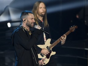 Adam Levine, left, and James Valentine of Maroon 5 perform during the 2018 iHeartRadio Music Awards at The Forum in Inglewood, Calif. (Chris Pizzello/Invision/AP/File)