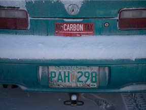 REGINA, SASK : February 12, 2019 -- A car, sitting in the University of Regina parking lot wars a "No Carbon Tax" bumper sticker the day before Canada and Saskatchewan are set to meet in the provincial Court of Appeal to debate the constitutionality of said tax. BRANDON HARDER/ Regina Leader-Post