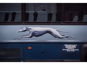 The Greyhound logo is seen on one of the company's buses, in Vancouver, on Monday July 9, 2018.