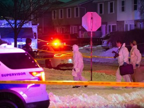 Investigators in Brampton prepare to enter the home where 11-year-old Riya Rajkumar was found dead.