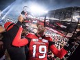 The Saskatchewan Roughriders made a major pitch for quarterback Bo Levi Mitchell, who opted to re-sign with the Calgary Stampeders on Tuesday.