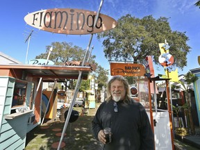 Artist Dan Painter, 56, St. Petersburg, talks about his Tiny Town outdoor art studio in St. Petersburg, Fla., Jan. 11, 2019. The town is made up of 11 art pieces he created. The structures include: a drive-in, radio station, fishing pier, seafood restaurant, auto garage, motel, officers club, bath house, gas station, barber shop, bank, and salvage yard. He is currently working on adding a trailer park.