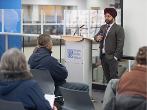 Lawyer Bhavan Jaggi speaks to a crowd about representing yourself in court during a Legal Resource Fair held at the Regina Public Library's downtown location on Saturday.