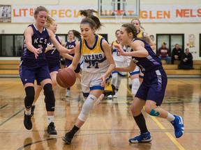 The O'Neill Titans'  Lexis Herman, 14, drives to the basket against the Kelowna Christian School Knights during senior girls action at the Luther Invitational Tournament on Thursday. O'Neill won 56-53.