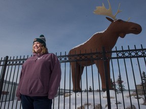 Jacki L'Heureux-Mason, executive director of Tourism Moose Jaw, stands in front of a statue known as Mac the Moose, which faces out toward Highway 1 on the north end of Moose Jaw.