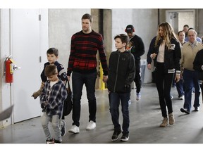New England Patriots quarterback Tom Brady, his wife Gisele Bundchen, and their family arrive for a NFL football walkthrough, Saturday, Feb. 2, 2019, in Atlanta, ahead of Super Bowl 53 against the Los Angeles Rams.