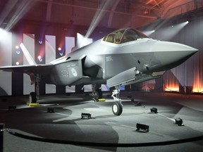 The unveiling of the first F-35 fighter plane to be delivered to the Netherlands, which is partnering with the United States in the fighter program, at Lockheed Martin Aeronautics in Fort Worth, Texas, Jan. 30.