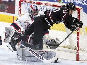 The Red Deer Rebels' Brandon Hagel, shown in front of Regina Pats goaltender Max Paddock on Wednesday, demonstrated the skills that were commonly associated with members of the Pats over the past two seasons.