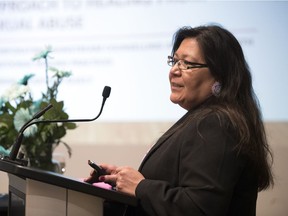 Corrine McArthur, sexual assault counsellor for the non-profit agency, Society for the Involvement of Good Neighbours (SIGN), gives her  presentation "Integrating Mainstream Counselling with First Nations Healing Practices" at the first annual Sexual Assault Services of Saskatchewan Leadership Forum at the Ramada Hotel in Regina.