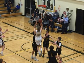 Andy Vanderhooft, 10, of the Luther Lions takes a shot against the Winnipeg John Taylor Pipers in LIT action Thursday.