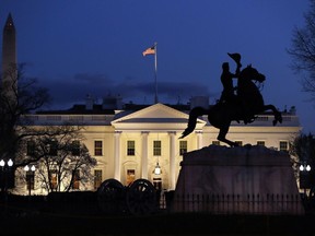 The White House is seen at dusk, Friday March 22, 2019, in Washington. Special counsel Robert Mueller has concluded his investigation into Russian election interference and possible coordination with associates of President Donald Trump. The Justice Department says Mueller delivered his final report to Attorney Barr, who is reviewing it.