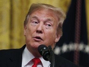 President Donald Trump speaks before signing an executive order requiring colleges to certify that their policies support free speech as a condition of receiving federal research grants, Thursday March 21, 2019, in the East Room of the White House in Washington. (AP Photo/Jacquelyn Martin) President Donald Trump signs an executive order requiring colleges to certify that their policies support free speech as a condition of receiving federal research grants, Thursday March 21, 2019, in the East Room of the White House in Washington.