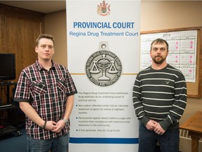 Dan Woodley, left, and Lyndon Sprague, both of whom have completed Drug Treatment Court, stand in a courtroom at the provincial court house on Smith Street.