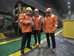 Minister of Public Safety Ralph Goodale, from left, Evraz CEO and President Conrad Winkler and Brad Forster, VP of tubular operation tour the Evraz facility.