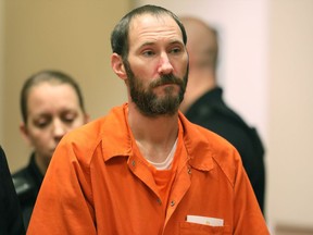 FILE - In this Dec. 14, 2018 file pool photo, Johnny Bobbitt stands during a hearing at Burlington County Courthouse in Mount Holly, N.J. Bobbitt, a homeless man charged with engaging in a GoFundMe scheme, pleaded guilty in federal court in in Camden, N.J., Wednesday, March 6, 2019, to conspiracy to commit money laundering.