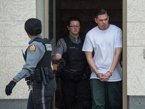 Duran Redwood, convicted of second-degree murder in the death of Celeste Yawney, leaves Regina's Court of Queen's bench after being sentenced to life in prison.