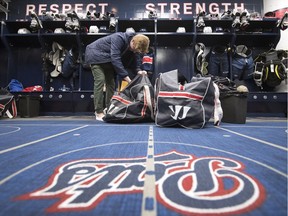 Regina Pats defenceman Steven Zonneveld cleans out his dressing-room stall at the Brandt Centre before departing for the off-season on Monday.