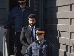 Jaskirat Singh Sidhu is taken out of the Kerry Vickar Centre by the RCMP following his sentencing for the Humboldt Broncos bus crash in Melfort, Sask., on Friday, March, 22, 2019.