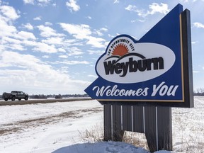 A welcome sign on the outskirts of Weyburn, Sask., on Thursday, March 14, 2019. A Saskatchewan city council that voted against building a group home for adults with disabilities plans to reconsider the application. A message from Weyburn City Council posted on its website says councillors met with representatives from the province and those involved with the project on Monday to discuss the issue.